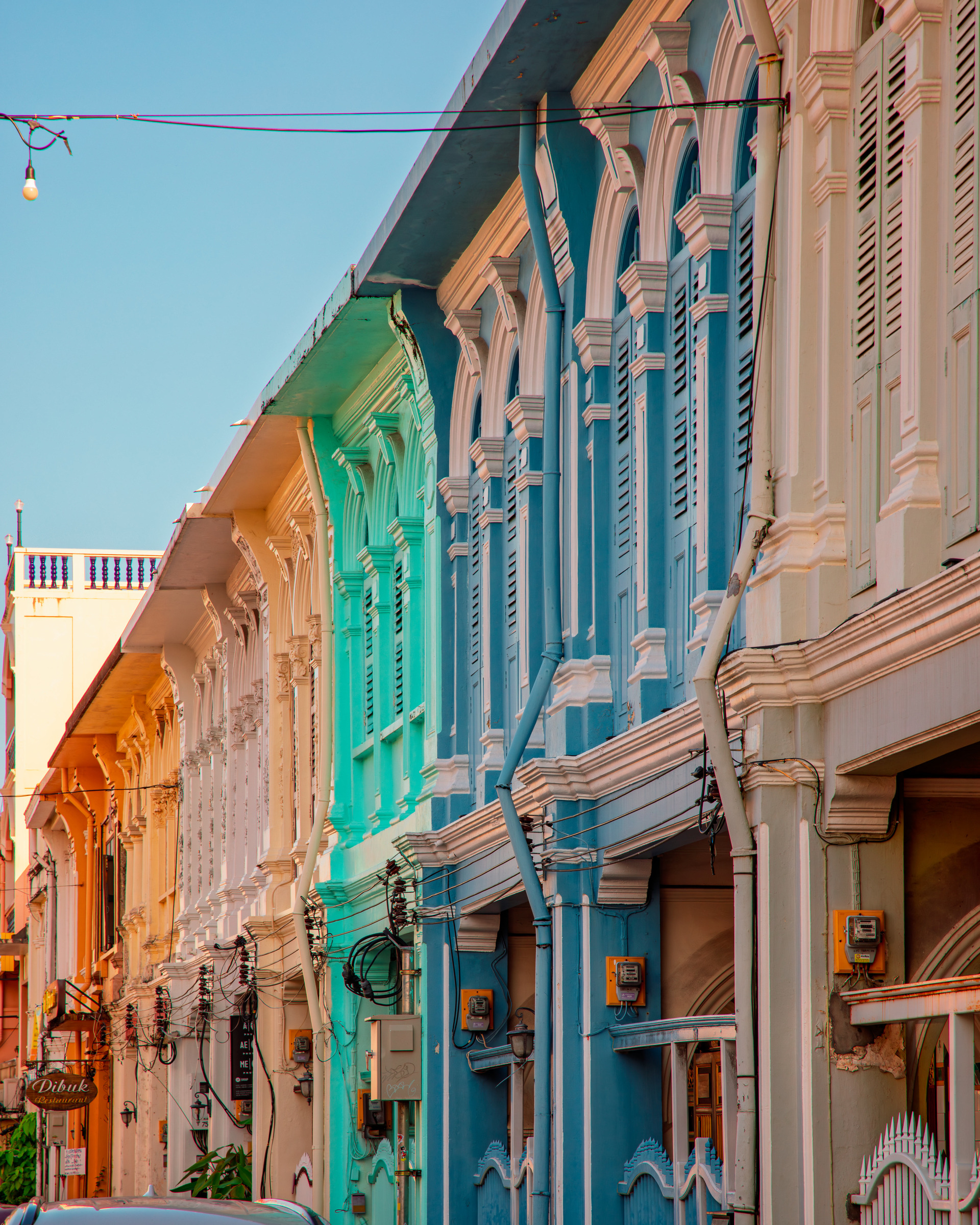Colourful colonial facades in blue, green and orange, Phuket Town, Thailand — Sino-Portuguese architectural photography